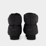 W Classic Mini Dipper Puffer 黑色皮毛一体踝靴