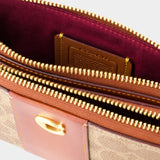 Kira 褐锈色帆布斜挎包