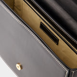 黑色皮质手拿斜挎翻盖包