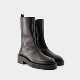 活希源 Courreges Zipped Ankle Boots 黑色皮质低筒靴