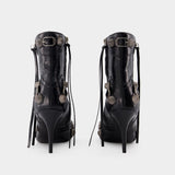 Balenciaga Cagole H90黑色皮质及踝高跟靴