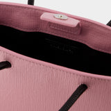 Balenciaga粉色皮质手机袋