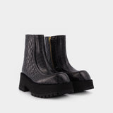 玛尼 Marni Zip Booties 皮质厚底踝靴