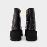 玛尼 Marni Zip Booties 皮质厚底踝靴