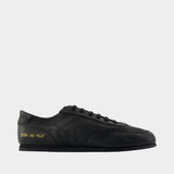Minimal Sneakers - COMMON PROJECTS - Leather - Black