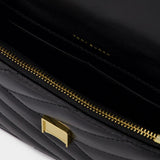 Tory Burch Kira Chevron 黑色皮质迷你手提WOC包