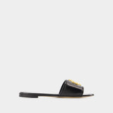 Tory Burch Eleanor黑色皮质拖鞋